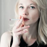 A woman smoking a cigarette